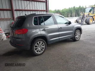 2016 Volkswagen Tiguan SE with VIN WVGBV7AX7GW526904, listed as a IAAI auction lot 42590816 with 73,758 mi miles and . Bid and sale history available at DreamBid. Image 4.
