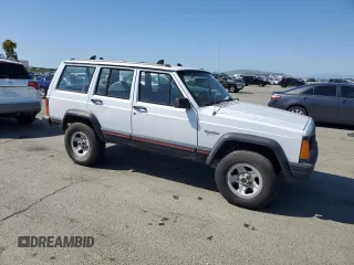 1994 Jeep Cherokee Sport with VIN 1J4FT68S2RL189475, listed as a Copart auction lot 53697465 with 188,210 mi miles and Clean Title. Bid and sale history available at carsss.com. Image 4.