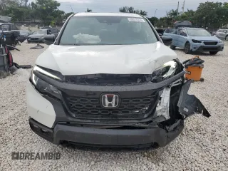 2021 Honda Passport EX-L with VIN 5FNYF7H55MB007768, listed as a Copart auction lot 89010335 with 21,551 mi miles and Salvage Title. Bid and sale history available at carsss.com. Image 5.