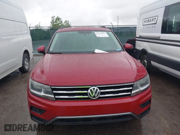 2018 Volkswagen Tiguan S with VIN 3VV0B7AX3JM095118, listed as a IAAI auction lot 42319834 with 100,759 mi miles and . Bid and sale history available at DreamBid. Image 13.