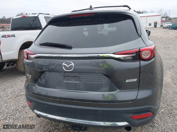 2016 Mazda CX-9 Grand Touring with VIN JM3TCBDY1G0103560, listed as a IAAI auction lot 41344813 with 123,588 mi miles. Bid and sale history available at carsss.com. Image 16.