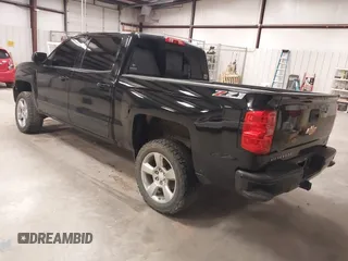 2017 Chevrolet Silverado 1500 LT with VIN 3GCUKREC6HG501307, listed as a IAAI auction lot 41611899 with 133,863 mi miles and . Bid and sale history available at DreamBid. Image 3.