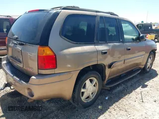2003 GMC Envoy SLT with VIN 1GKDS13S432246741, listed as a IAAI auction lot 42051902 with 344,691 mi miles and . Bid and sale history available at DreamBid. Image 4.