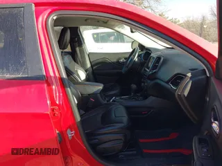 2019 Jeep Cherokee Trailhawk Elite with VIN 1C4PJMBX3KD217437, listed as a IAAI auction lot 41448614 with 85,889 mi miles. Bid and sale history available at carsss.com. Image 5.