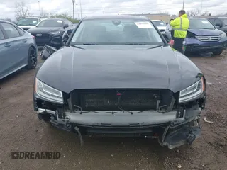2016 Audi A8 L 4.0T Sport with VIN WAU43AFD3GN020763, listed as a IAAI auction lot 41951858 with 104,563 mi miles. Bid and sale history available at carsss.com. Image 6.