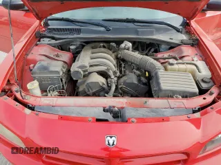 2008 Dodge Charger z VIN 2B3KA43R08H107971, wystawiony jako Copart lot #56942415 z przebiegiem 344 931 mil mil oraz Szkoda całkowita • Salvage title. Historia ofert i sprzedaży dostępna na DreamBid. Obrazek 11.