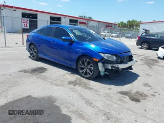 2021 Honda Civic Sport with VIN 2HGFC2F80MH527517, listed as a IAAI auction lot 42020871 with 36,058 mi miles and . Bid and sale history available at DreamBid. Image 1.