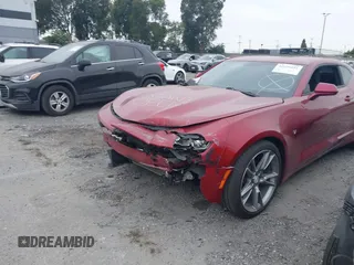 2021 Chevrolet Camaro 1LT with VIN 1G1FB1RX9M0107010, listed as a IAAI auction lot 42629591 with 65,450 mi miles and . Bid and sale history available at DreamBid. Image 2.