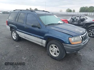 2000 Jeep Grand Cherokee Laredo with VIN 1J4G248S4YC144404, listed as a IAAI auction lot 42114635 with 181,854 mi miles and . Bid and sale history available at DreamBid. Image 1.
