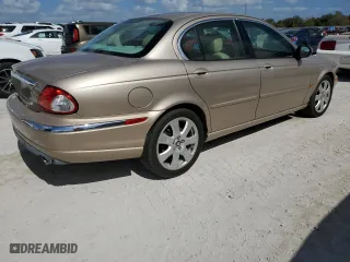 2004 Jaguar X-Type with VIN SAJEA51C34WE03194, listed as a Copart auction lot 78980144 with 51,164 mi miles and Clean Title. Bid and sale history available at carsss.com. Image 3.