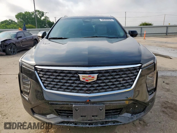 2024 Cadillac XT4 FWD Premium Luxury with VIN 1GYFZCR49RF248341, listed as a Copart auction lot 58586035 with 12,490 mi miles and Salvage title. Bid and sale history available at DreamBid. Image 5.