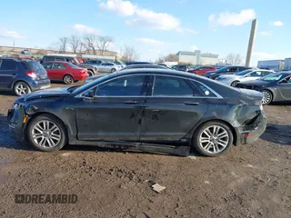 2016 Lincoln MKZ with VIN 3LN6L2J92GR618453, listed as a IAAI auction lot 41545429 with 134,229 mi miles and . Bid and sale history available at DreamBid. Image 13.