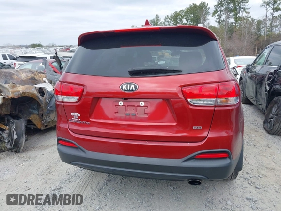 2018 Kia Sorento LX z VIN 5XYPG4A39JG400774, wystawiony jako IAAI lot #41711055 z przebiegiem 56 046 mil mil oraz . Historia ofert i sprzedaży dostępna na DreamBid. Obrazek 16.
