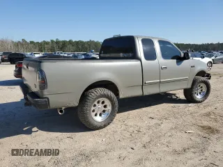 1999 Ford F-150 with VIN 1FTRX17W1XNC25527, listed as a Copart auction lot 48662525 with 150,544 mi miles and Salvage Title. Bid and sale history available at DreamBid. Image 3.