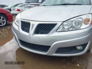 2009 Pontiac G6 1SB with VIN 1G2ZJ57K094243360, listed as a IAAI auction lot 41904278 with 144,346 mi miles and . Bid and sale history available at DreamBid. Image 6.