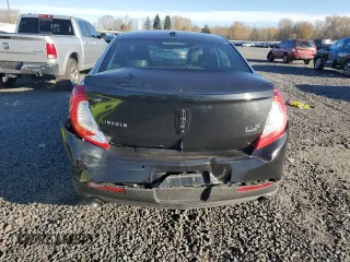 2014 Lincoln MKS EcoBoost with VIN 1LNHL9FT2EG600500, listed as a Copart auction lot 83764694 with 74,949 mi miles and Salvage title. Bid and sale history available at DreamBid. Image 6.