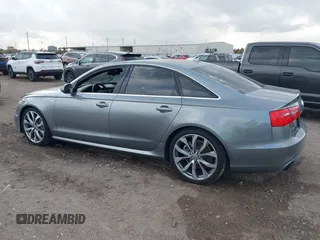 2013 Audi A6 3.0T Prestige with VIN WAUHGAFC3DN131239, listed as a IAAI auction lot 41168869 with 134,628 mi miles. Bid and sale history available at carsss.com. Image 13.