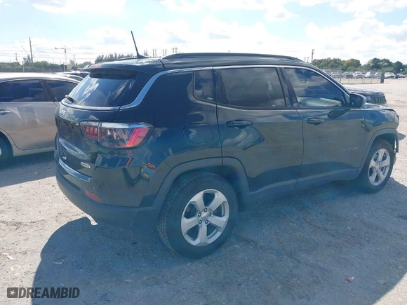 2020 Jeep Compass Latitude w/Sun/Safety Pkg with VIN 3C4NJCBB4LT253364, listed as a IAAI auction lot 41565377 with 60,551 mi miles. Bid and sale history available at carsss.com. Image 4.