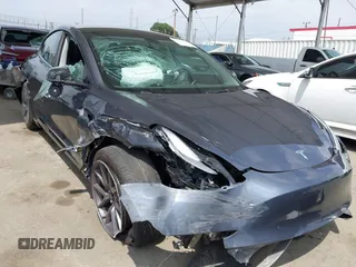 2023 Tesla Model 3 with VIN 5YJ3E1EA0PF518904, listed as a IAAI auction lot 42058540 with 20,945 mi miles and . Bid and sale history available at DreamBid. Image 6.
