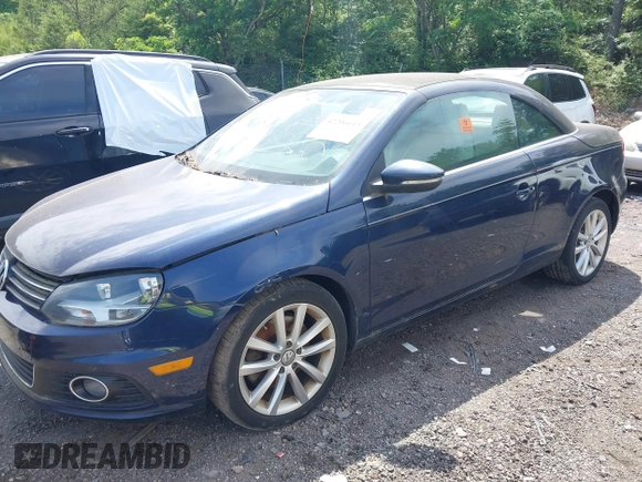 2012 Volkswagen Eos Komfort with VIN WVWBW7AH5CV005559, listed as a IAAI auction lot 42206644 with 160,843 mi miles and . Bid and sale history available at DreamBid. Image 2.