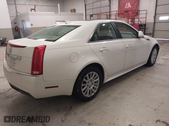 2011 Cadillac CTS Sedan Luxury with VIN 1G6DG5EY0B0144100, listed as a IAAI auction lot 41064767 with 87,922 mi miles. Bid and sale history available at carsss.com. Image 4.