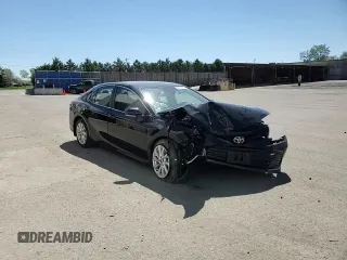 2023 Toyota Camry LE z VIN 4T1R11AK3PU776521, wystawiony jako Copart lot #55927255 z przebiegiem 50 323 mil mil oraz Szkoda całkowita • Salvage title. Historia ofert i sprzedaży dostępna na DreamBid. Obrazek 14.