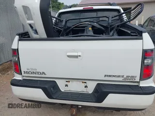 2013 Honda Ridgeline RTL with VIN 5FPYK1F58DB018542, listed as a IAAI auction lot 42465817 with 112,898 mi miles and . Bid and sale history available at DreamBid. Image 17.