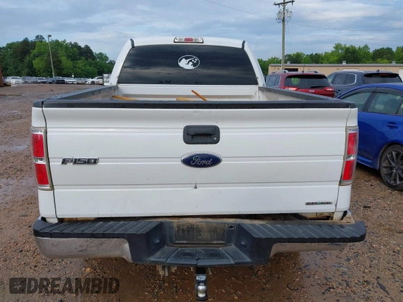 2014 Ford F-150 XL with VIN 1FTMF1CM7EFC60291, listed as a IAAI auction lot 42503556 with 215,474 mi miles and . Bid and sale history available at DreamBid. Image 16.