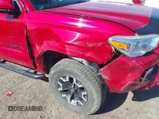 2022 Toyota Tacoma SR with VIN 3TYAX5GN3NT041035, listed as a IAAI auction lot 41975885 with 25,619 mi miles and . Bid and sale history available at DreamBid. Image 6.