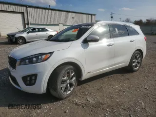 2016 Kia Sorento SXL z VIN 5XYPKDA16GG102852, wystawiony jako Copart lot #75659454 z przebiegiem Nie podano mil oraz Nie do naprawy • Non repairable. Historia ofert i sprzedaży dostępna na DreamBid. Obrazek 1.