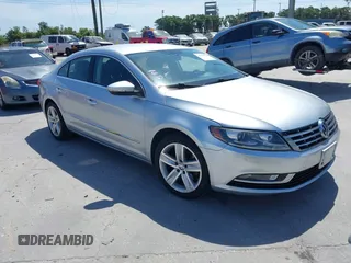 2014 Volkswagen CC R-Line with VIN WVWBP7AN3EE509761, listed as a IAAI auction lot 42111771 with 143,880 mi miles and . Bid and sale history available at DreamBid. Image 1.