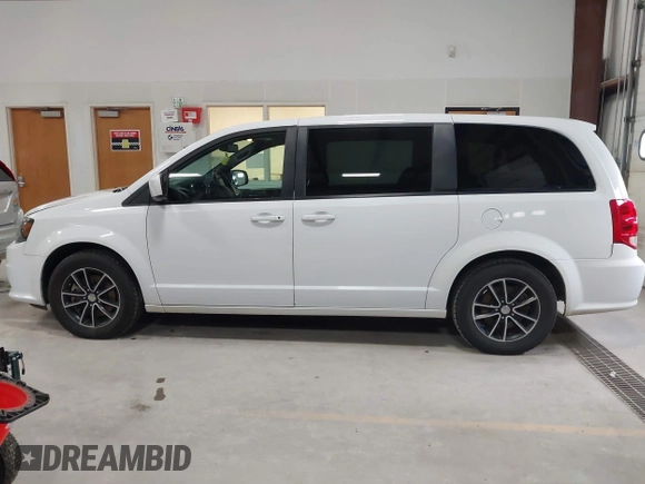 2019 Dodge Grand Caravan SE with VIN 2C4RDGBG8KR503122, listed as a IAAI auction lot 41983380 with 128,692 mi miles and . Bid and sale history available at DreamBid. Image 14.