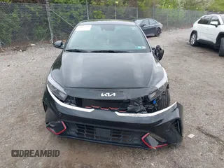 2023 Kia Forte GT-Line z VIN 3KPF54ADXPE627228, wystawiony jako IAAI lot #42022939 z przebiegiem 50 574 mil mil oraz . Historia ofert i sprzedaży dostępna na DreamBid. Obrazek 13.
