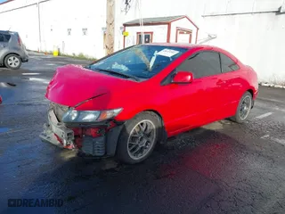 2009 Honda Civic Cpe EX with VIN 2HGFG11839H521899, listed as a IAAI auction lot 40613302 with 227,958 mi miles. Bid and sale history available at carsss.com. Image 2.