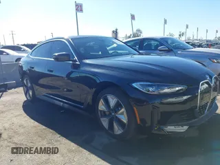 2024 BMW i4 eDrive40 with VIN WBY73AW06RFS52041, listed as a IAAI auction lot 41320110 with 21,810 mi miles. Bid and sale history available at carsss.com. Image 1.