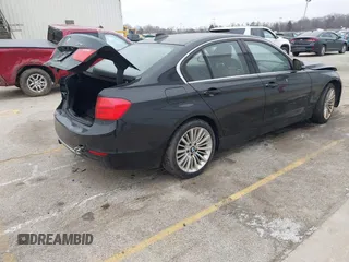 2014 BMW 3 Series 328i xDrive with VIN WBA3B5G56ENS06534, listed as a IAAI auction lot 41549553 with 165,779 mi miles and . Bid and sale history available at DreamBid. Image 4.