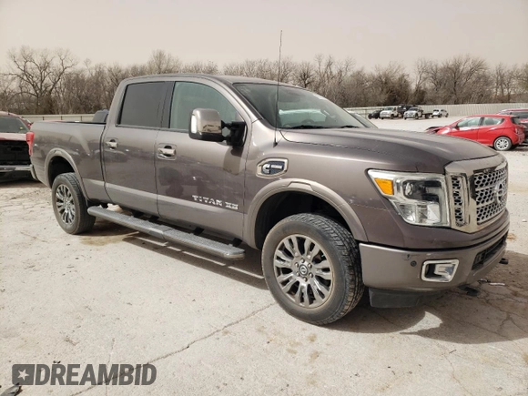 2016 Nissan Titan Pro-4X z VIN 1N6BA1F4XGN502773, wystawiony jako Copart lot #49285535 z przebiegiem 129 390 mil mil oraz Czysty tytuł • Clean title. Historia ofert i sprzedaży dostępna na DreamBid. Obrazek 4.