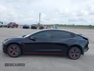 2023 Tesla Model 3 z VIN 5YJ3E1EA5PF484040, wystawiony jako IAAI lot #42128327 z przebiegiem 51 210 mil mil oraz . Historia ofert i sprzedaży dostępna na DreamBid. Obrazek 14.