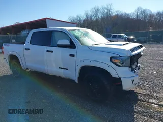 2021 Toyota Tundra SR5 z VIN 5TFDY5F13MX981431, wystawiony jako IAAI lot #37934403 z przebiegiem 69 751 mil mil oraz . Historia ofert i sprzedaży dostępna na DreamBid. Obrazek 1.