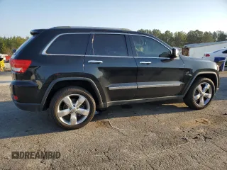 2011 Jeep Grand Cherokee Overland with VIN 1J4RS6GT5BC648076, listed as a Copart auction lot 48878135 with 223,263 mi miles and Salvage Title. Bid and sale history available at DreamBid. Image 3.