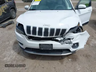 2019 Jeep Cherokee Limited with VIN 1C4PJLDB1KD387310, listed as a IAAI auction lot 42190270 with 96,635 mi miles and . Bid and sale history available at DreamBid. Image 6.