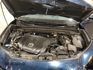 2020 Mazda CX-30 with VIN 3MVDMBBL0LM114783, listed as a Copart auction lot 50521185 with 48,769 mi miles and Salvage Title. Bid and sale history available at DreamBid. Image 14.