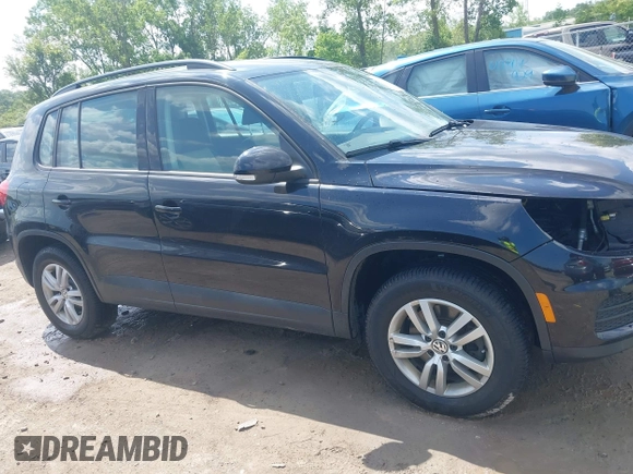 2016 Volkswagen Tiguan S with VIN WVGAV7AX9GW525250, listed as a IAAI auction lot 42393412 with 154,919 mi miles and . Bid and sale history available at DreamBid. Image 14.