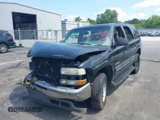 2003 Chevrolet Tahoe LS with VIN 1GNEC13V13J277725, listed as a IAAI auction lot 42610589 with Not provided miles and . Bid and sale history available at DreamBid. Image 2.