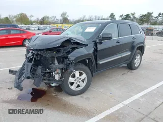 2011 Jeep Grand Cherokee Laredo z VIN 1J4RR4GG8BC504878, wystawiony jako IAAI lot #42097973 z przebiegiem 190 583 mil mil oraz . Historia ofert i sprzedaży dostępna na DreamBid. Obrazek 2.