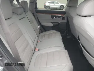 2021 Honda CR-V Touring with VIN 2HKRW1H96MH420465, listed as a Copart auction lot 86885384 with 61,699 mi miles and Salvage Title. Bid and sale history available at carsss.com. Image 11.