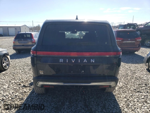 2023 Rivian R1S Adventure with VIN 7PDSGABA3PN012584, listed as a Copart auction lot 47557575 with 8,633 mi miles and Salvage Title. Bid and sale history available at carsss.com. Image 6.