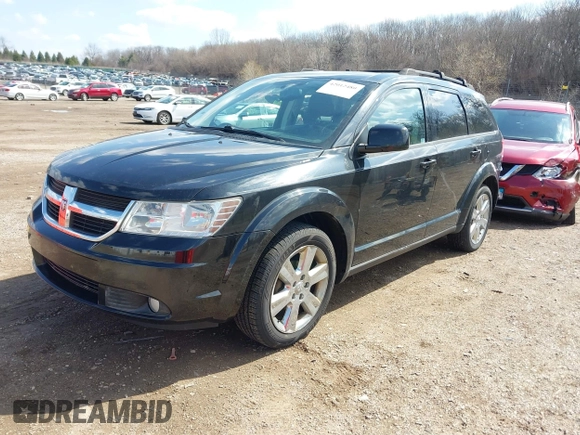 2010 Dodge Journey SXT with VIN 3D4PH5FV4AT135822, listed as a IAAI auction lot 42012480 with 124,480 mi miles and . Bid and sale history available at DreamBid. Image 2.