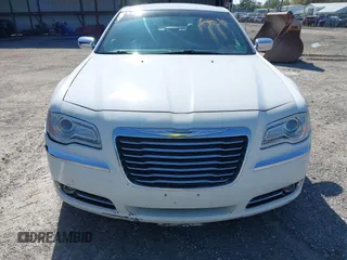 2012 Chrysler 300 Limited with VIN 2C3CCACG4CH250588, listed as a IAAI auction lot 41943257 with 236,242 mi miles and . Bid and sale history available at DreamBid. Image 12.