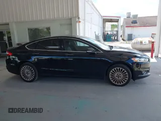 2016 Ford Fusion Titanium with VIN 3FA6P0K99GR235692, listed as a IAAI auction lot 42587743 with 169,467 mi miles and . Bid and sale history available at DreamBid. Image 13.